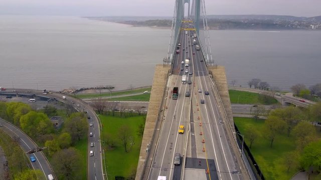 Aerial view of Verrazano bidge and overpass in Brooklyn, New York City. NYC from above Hudson river.