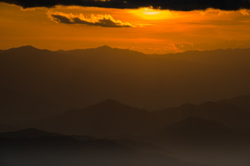 Obraz premium beautiful Sunset with mountain view in Mae Hong Son's city, North of THAILAND.