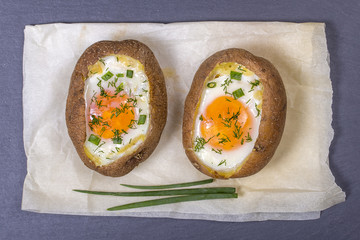 Baked potatoes stuffed with cheese and egg