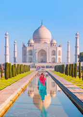 Young woman in traditional indian clothes - Taj Mahal, Agra / Woman walking on the water