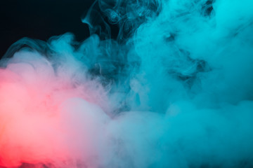 Colorful smoke on a black background closeup