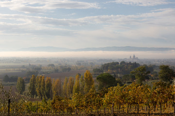 Umbria valley at dawn, with S.Maria degli Angeli church (Assisi)