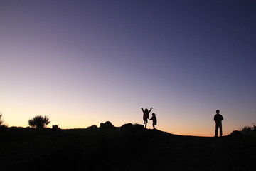 Fototapeta na wymiar Three People Silhouette, New Zealand