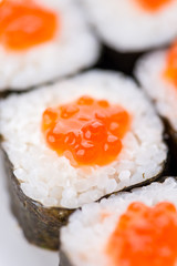 Sushi set and composition at white background. Japanese food restaurant, sushi maki gunkan roll plate or platter set.