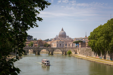 Fototapeta premium view on a bridge and a boat in Rome