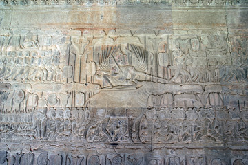 Angkor Cambodia, 12th century Angkor Wat temple bas relief - Yama, eighteen-armed ruler of Hell, rides a buffalo while judging the newly dead.