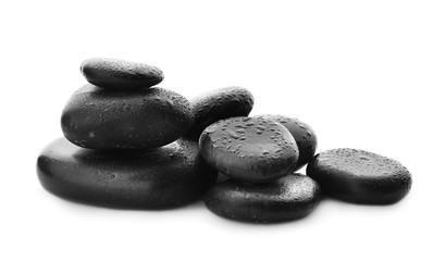 Pile of spa stones on white background