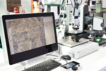 Digital microscope and monitor in laboratory