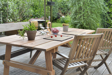  table with wine and glasses to a drink in terrace 