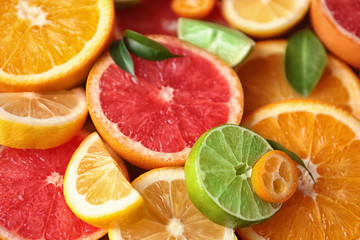 Slices of fresh citrus fruits, closeup