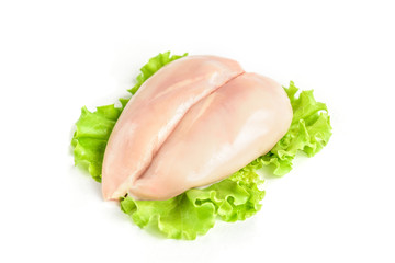 Raw chicken breast and green salad isolated on white background.