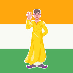 A young Indian guy dressed in lungi clothes stands on the background of the Indian flag and waves his hand
