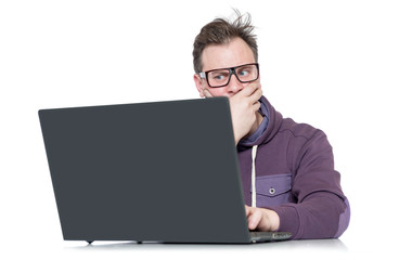 Male programmer in glasses with laptop, isolated on white background