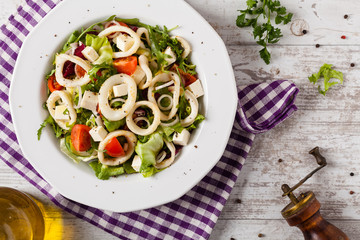 Salad with squid rings.