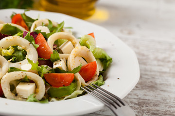 Salad with squid rings.