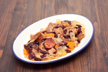 typical portuguese dish feijoada transmontana on white plate