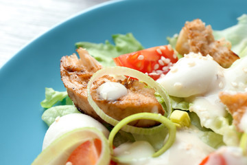 Tasty salad with meat and cherry tomatoes on plate