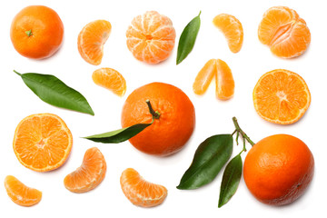 mandarin with slices and green leaf isolated on white background top view - obrazy, fototapety, plakaty