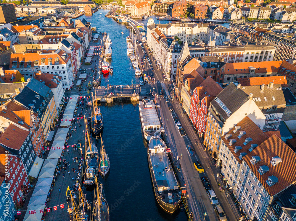 Wall mural Copenhagen, Denmark Nyhavn New Harbour canal and entertainment district. Aerial view from the top. tourist popular must visited place.