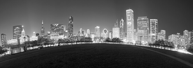 Black and white fisheye lens picture of Chicago skyline at night, USA.