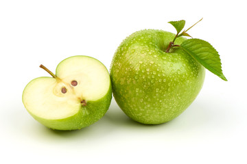 Whole green apple granny smith with leaf and half, isolated on white background.