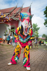 Loei province ,Thailand - July, 06, 2019 : Ghost Festival Phi Ta Khon.People are enjoy dressing with colorful clothes made from wood handmake in Loei province ,Thailand