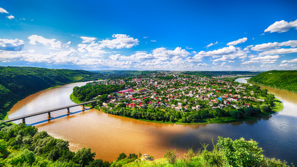 Fototapeta na wymiar Panorama of the Dniester river canyon. Top view of the city Zalischyky. Ukraine, Europe.