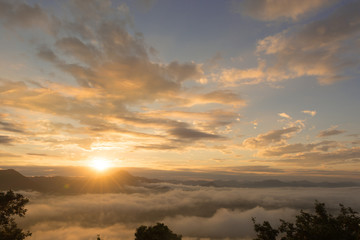 sunrise in the morning with fog over mountain