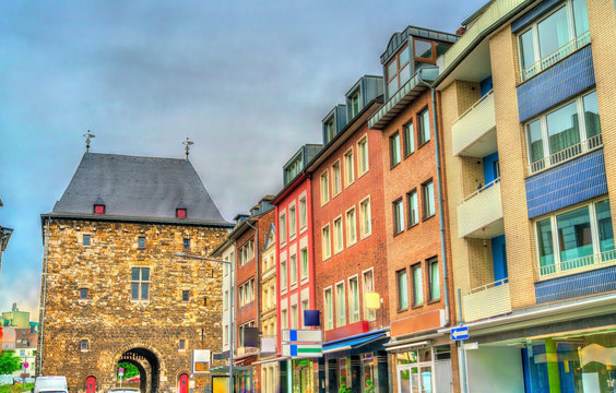 Street in Aachen leading towards Ponttor, a medieval city gate. Germany