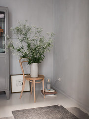 Corner of a room with huge flowers 