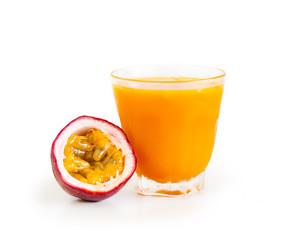 Passion fruit and passion fruit juice In a glass White isolated background 