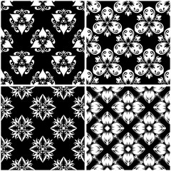 Floral patterns. Set of black and white seamless backgrounds