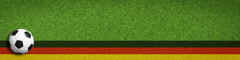 Fußball auf dem Rasen / Spielfeld / Deutschland flagge © Coloures-Pic