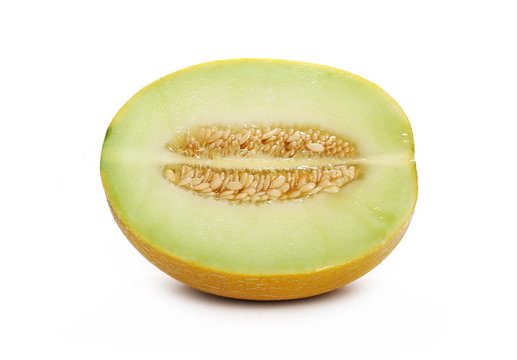 Fresh cantaloupe melon cut, sliced in half isolated on white background