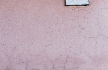 Gray background of concrete with pits and indentations.