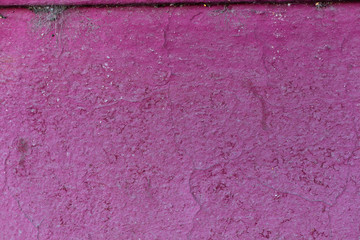 Gray background of concrete with pits and indentations.