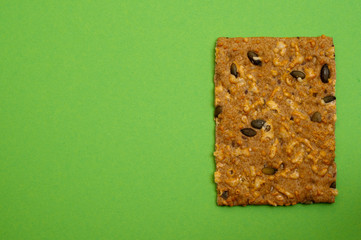 bread with nuts on a green background