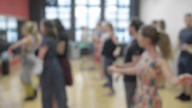 Latin Dancing At The Salsa School - teaching a new Movement
