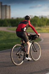 Fototapeta na wymiar Cyclist in maximum effort in a road outdoors