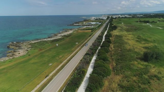 Car drive near the Sea coast in Italy Drone flight 4k