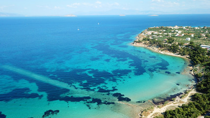 Aerial drone bird's eye view of iconic temple of Apollo on top of Kolona hill with only one pillar...