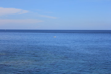 Fototapeta premium Panoramic View of the Peaceful Coastline and Village of Lanyu (Orchid Island) at Taitung, Taiwan
