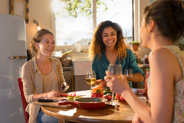 Multi-ethnic group of friends having fun while preparing lunch 