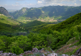 Fototapeta na wymiar Panorama of a mountain village in the lowland