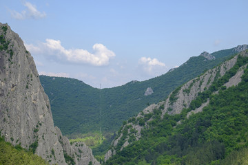 Fototapeta na wymiar Peak of a mountain against a blue sky 2