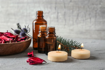 Composition with bottles of essential oils on table. Natural cosmetics
