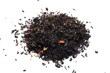 Heap of dry black tea on white background