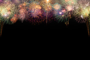 Set of colorful fireworks on black background.