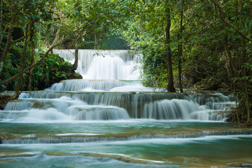 Huay Mae Khamin waterfalls in deep forest at Srinakarin National Park ,Kanchanaburi ,A beautiful stream water famous rainforest waterfall in Thailand