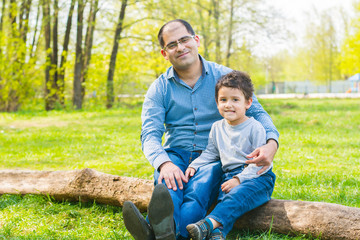 Fototapeta premium father and son relax in nature